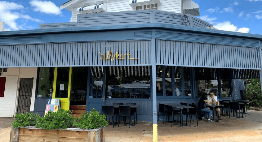 a building with tables and chairs
